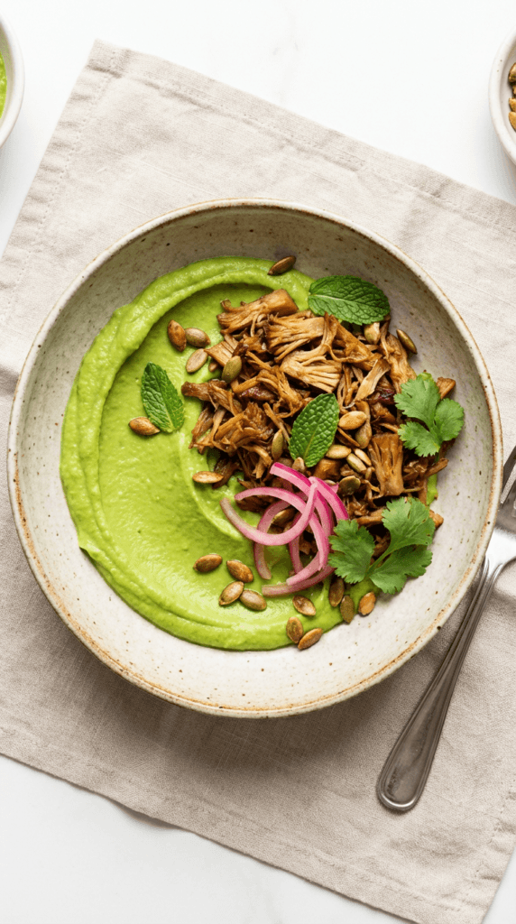 Jackfruit Carnitas Bowl with avocado puree: Luxurious, nourishing puree crowned with vibrant toppings—ideal for healthy lunch inspiration. Save this idea so you can come back to it later.
