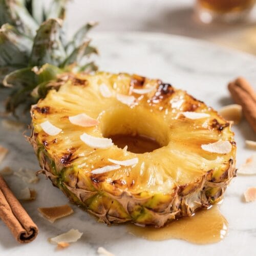 Tropical Grilled Pineapple Bliss: Juicy, caramelized pineapple with toasted coconut and syrup—naturally sweet for gourmet snacking. Save this idea so you can come back to it later.