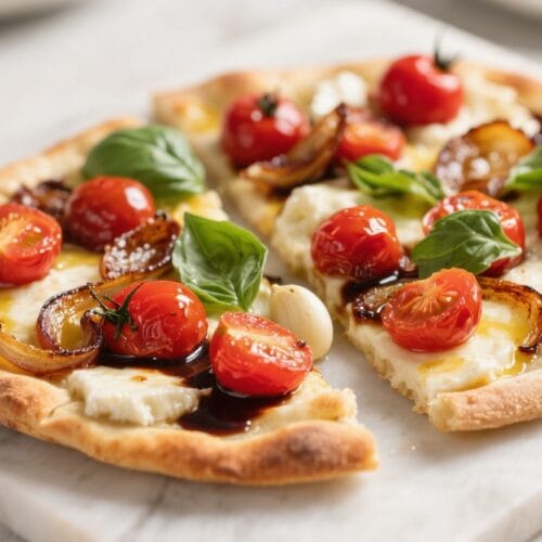 Flatbread Bliss: Rustic, aromatic pizza with bubbling mozzarella & sweet tomatoes—ideal for easy gourmet dinners. Save this idea so you can come back to it later.