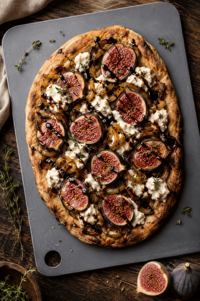 Fig & Caramelized Onion Flatbread: Savor warm, gourmet flatbread with creamy cheese and balsamic—ideal for cozy dinners. Save this idea so you can come back to it later.