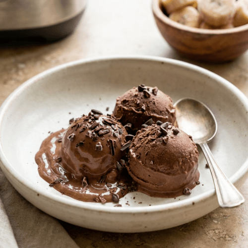 Vegan Chocolate Banana Ice Cream: Rich, creamy scoops with melty texture & chocolate shavings. Indulgent, dairy-free treat—save this idea so you can come back to it later.