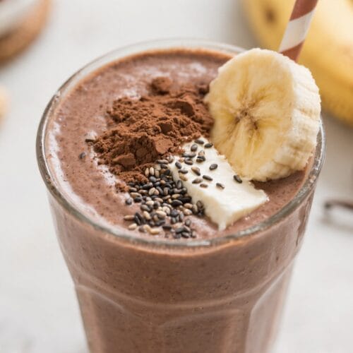 Chocolate Smoothie Bliss: Creamy, energizing glass with banana, yogurt, chia seeds & cocoa—great for healthy mornings. Save this idea so you can come back to it later.